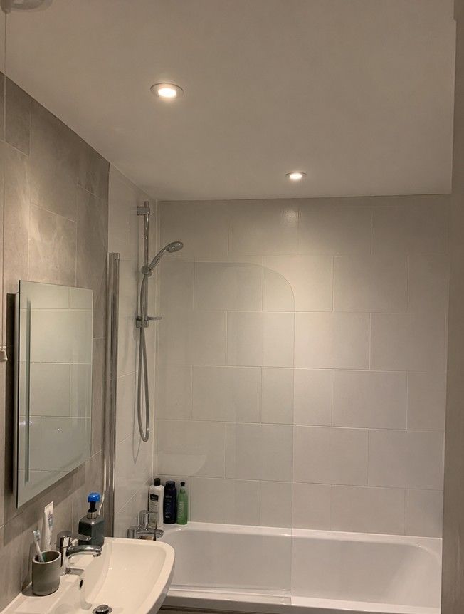 IP-rated LED downlights installed in a Derby bathroom by Derbyshire Electrical Specialists