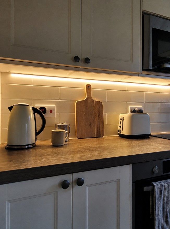 Under-cabinet LED strip lighting installed in a Derby kitchen by Derbyshire Electrical Specialists