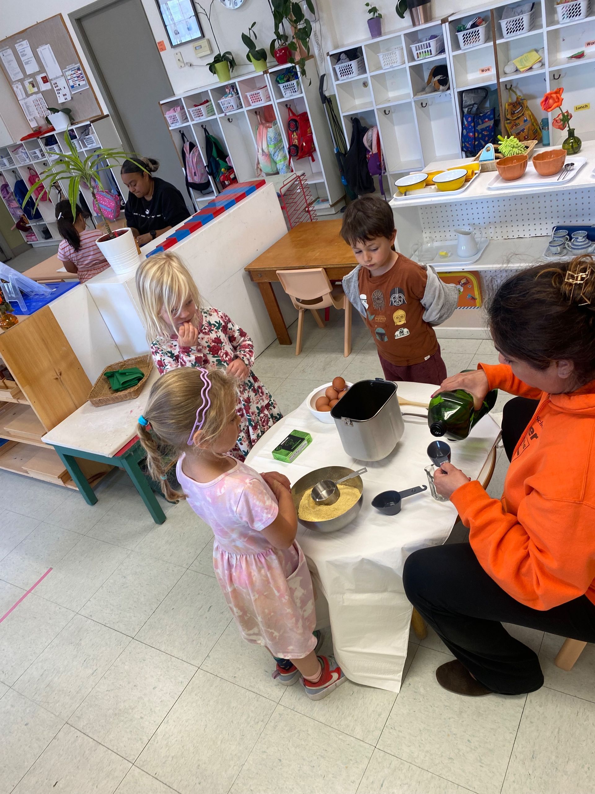 montessori child working with practical life activity