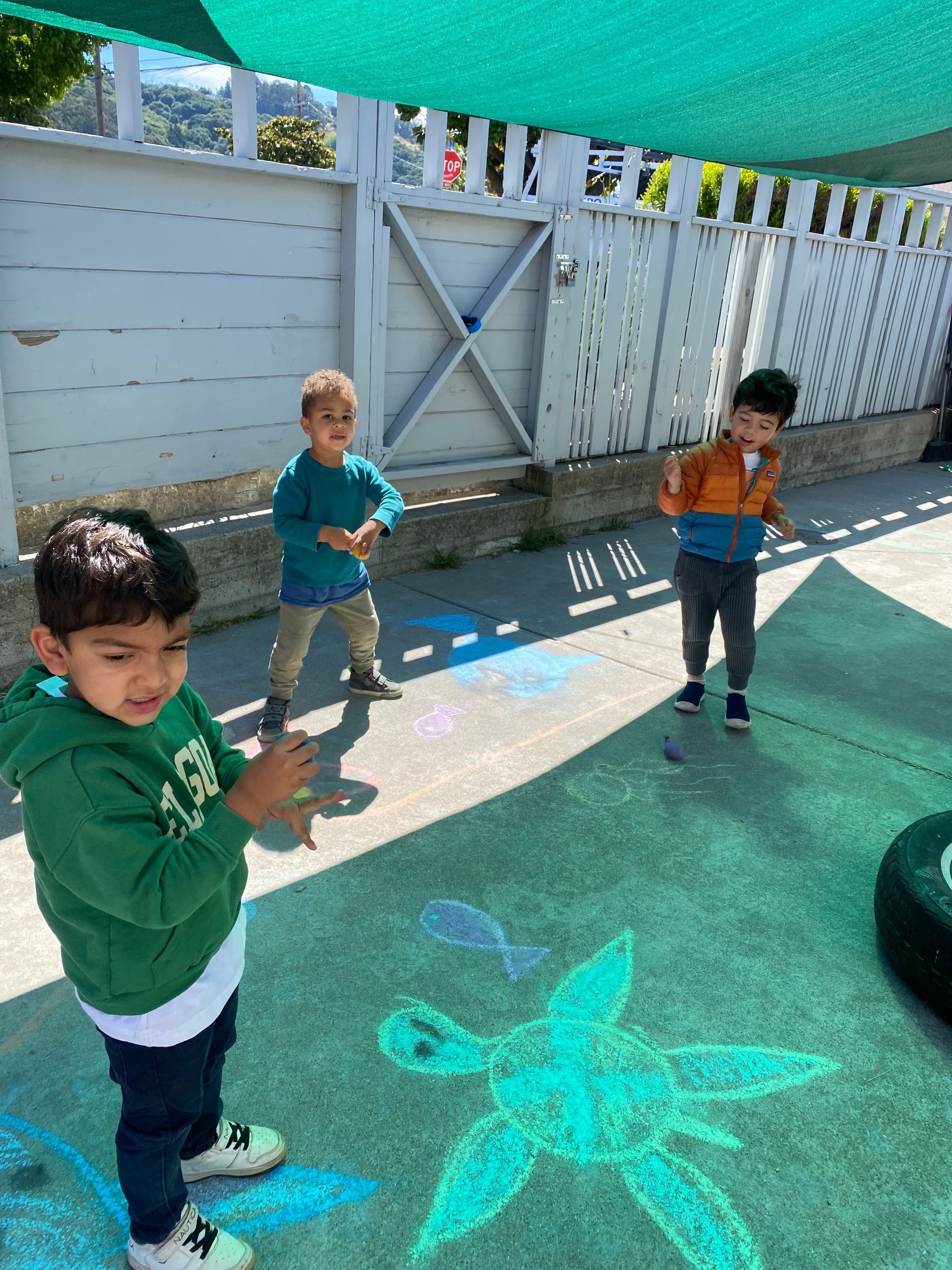 montessori children playing outside the classroom