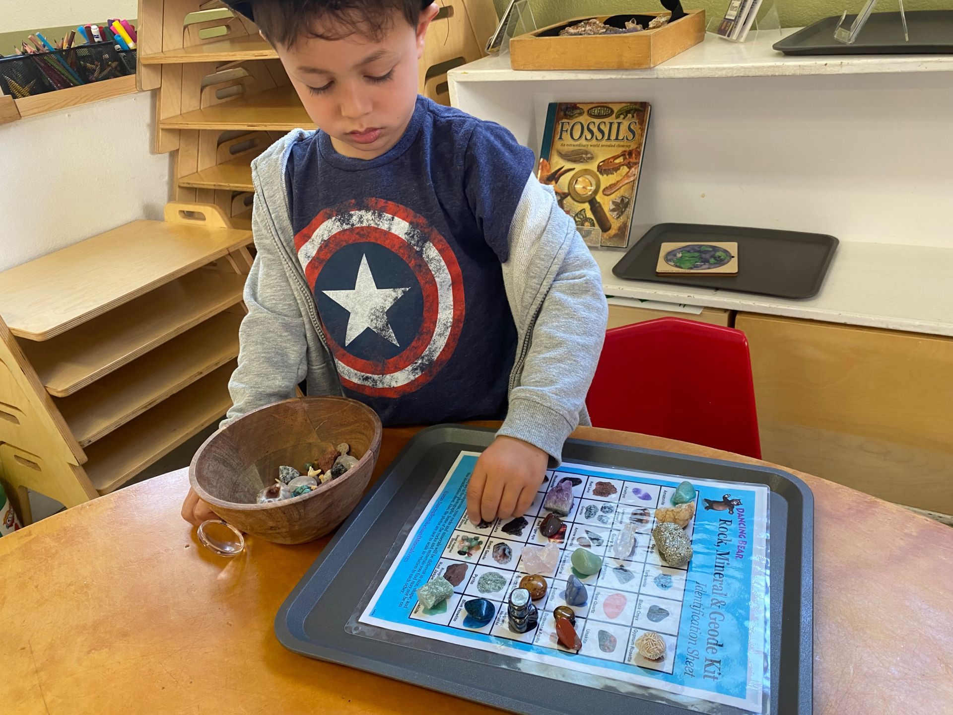 montessori primary child working with sensorial activity