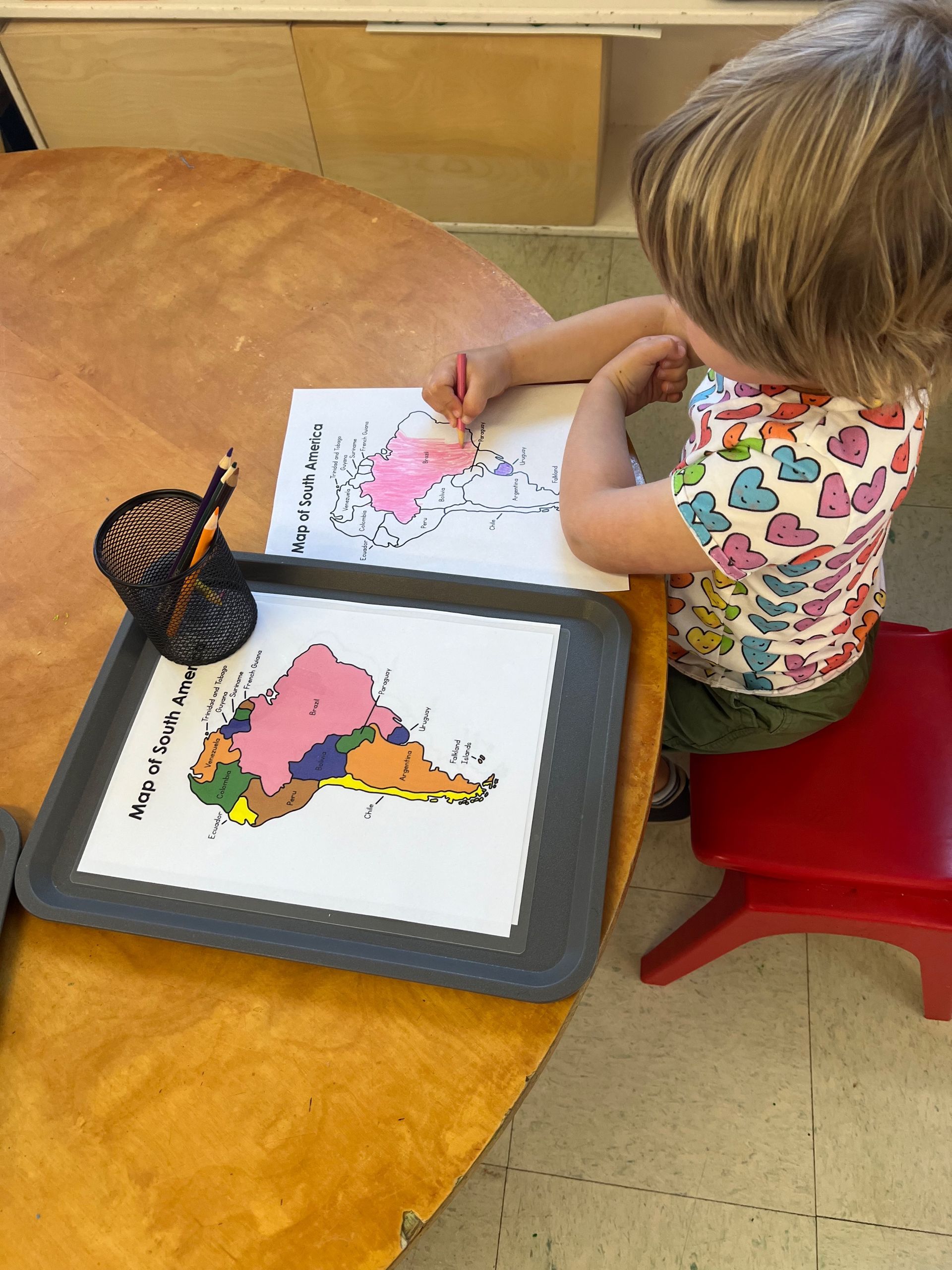 montessori primary working with drawing activity