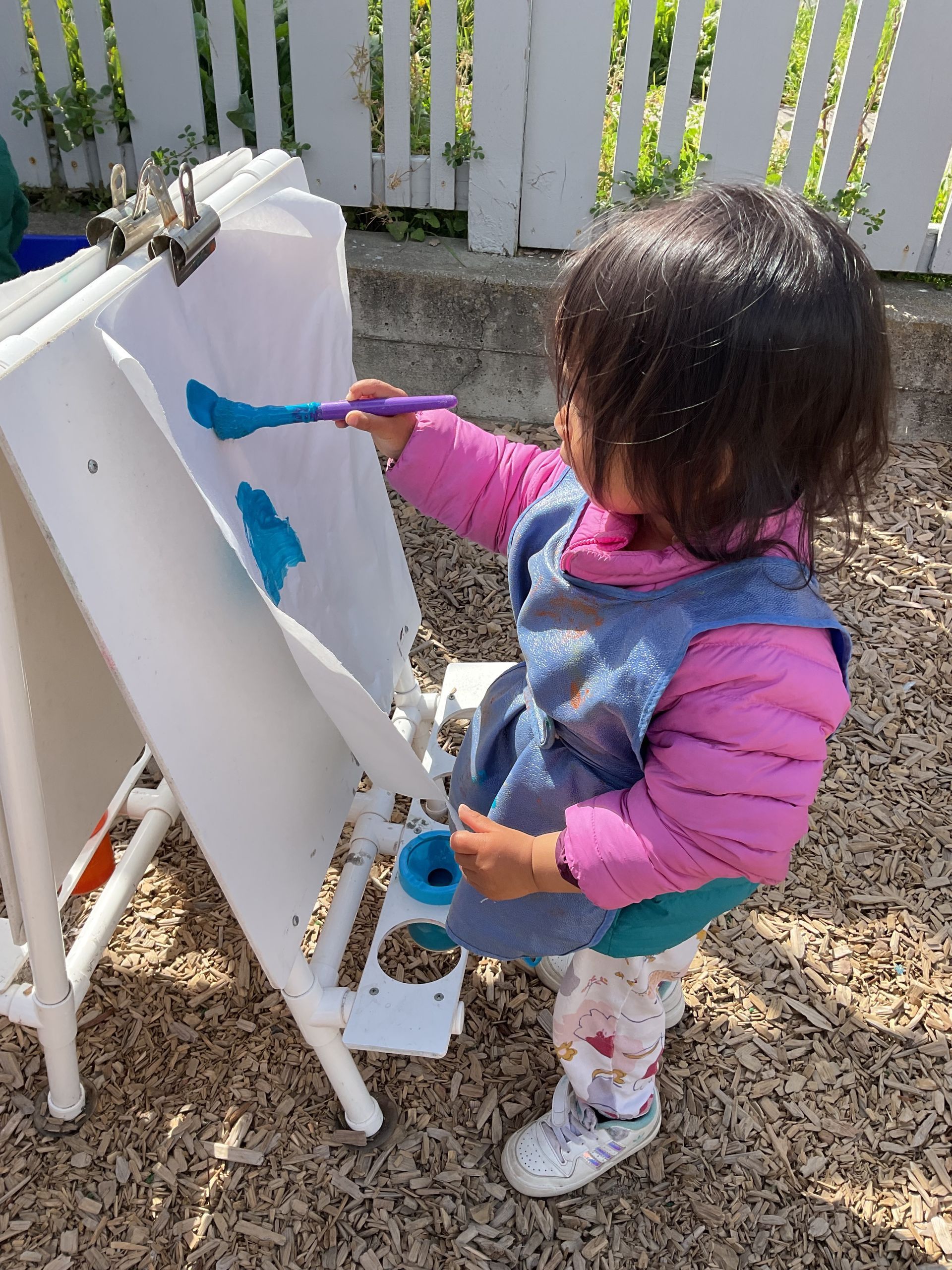 montessori toddler working with painting activity