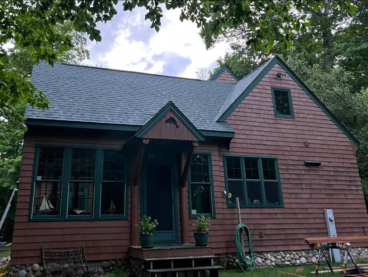 Home featuring a premium shingle roof, highlighting expert installation and lasting performance. Trusted roofing contractor in Gaylord, MI.