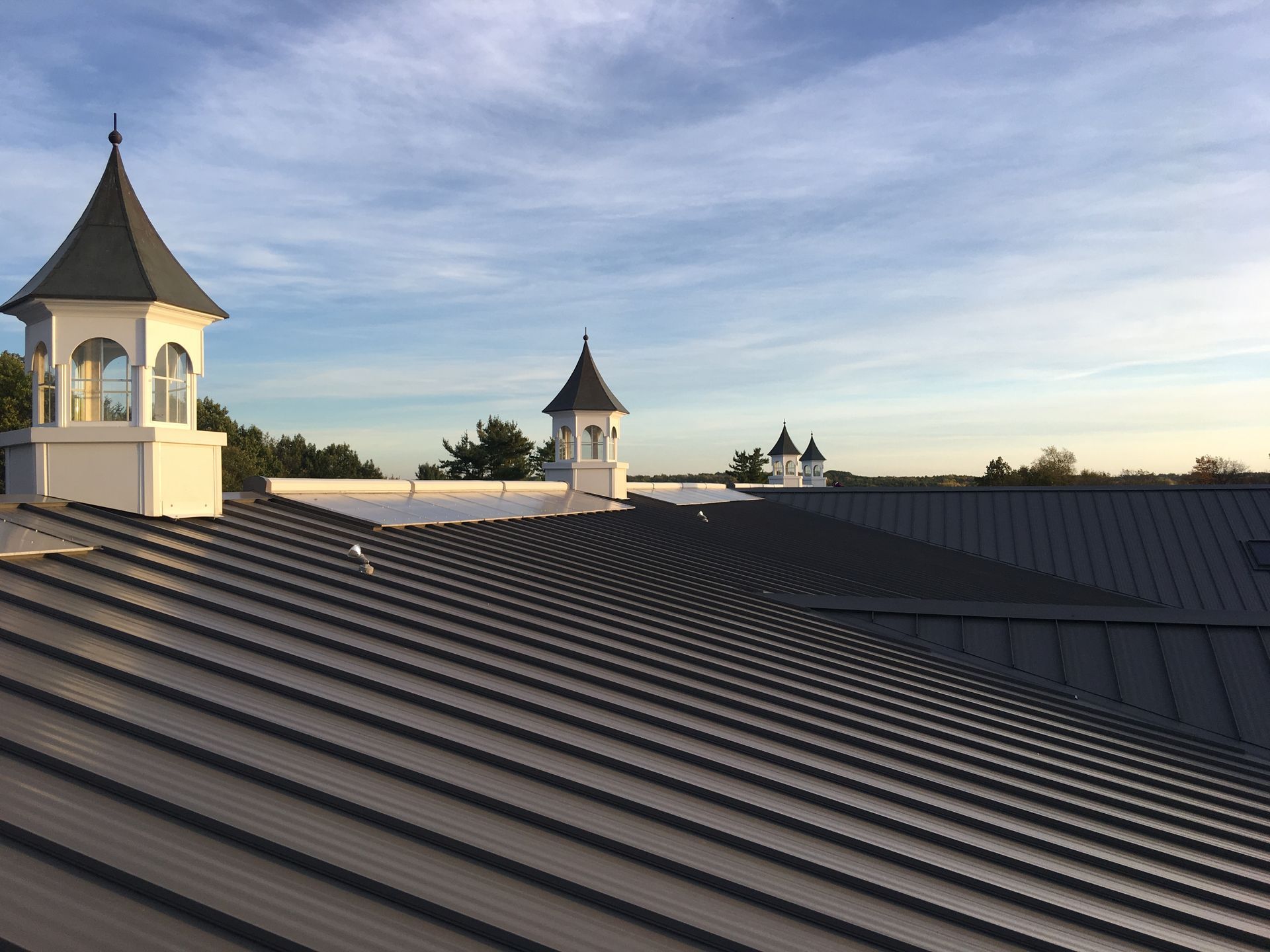 Home featuring a premium metal roof, offering weather resistance and modern style. Trusted roofing contractor in Gaylord, MI.