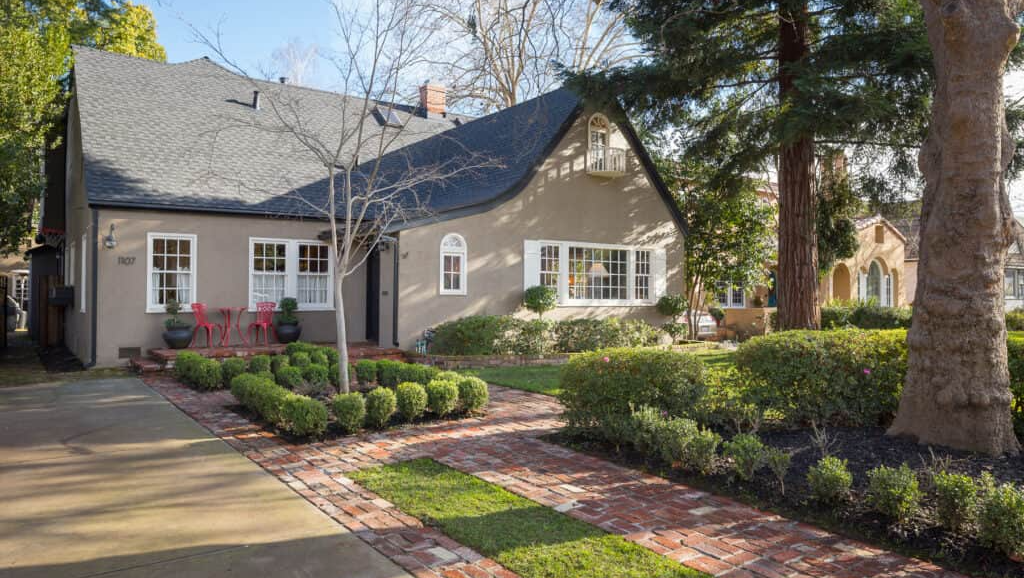 A house with a brick walkway | Explore Homes for sale in East Sac with Rich Cazneaux Real Estate Group