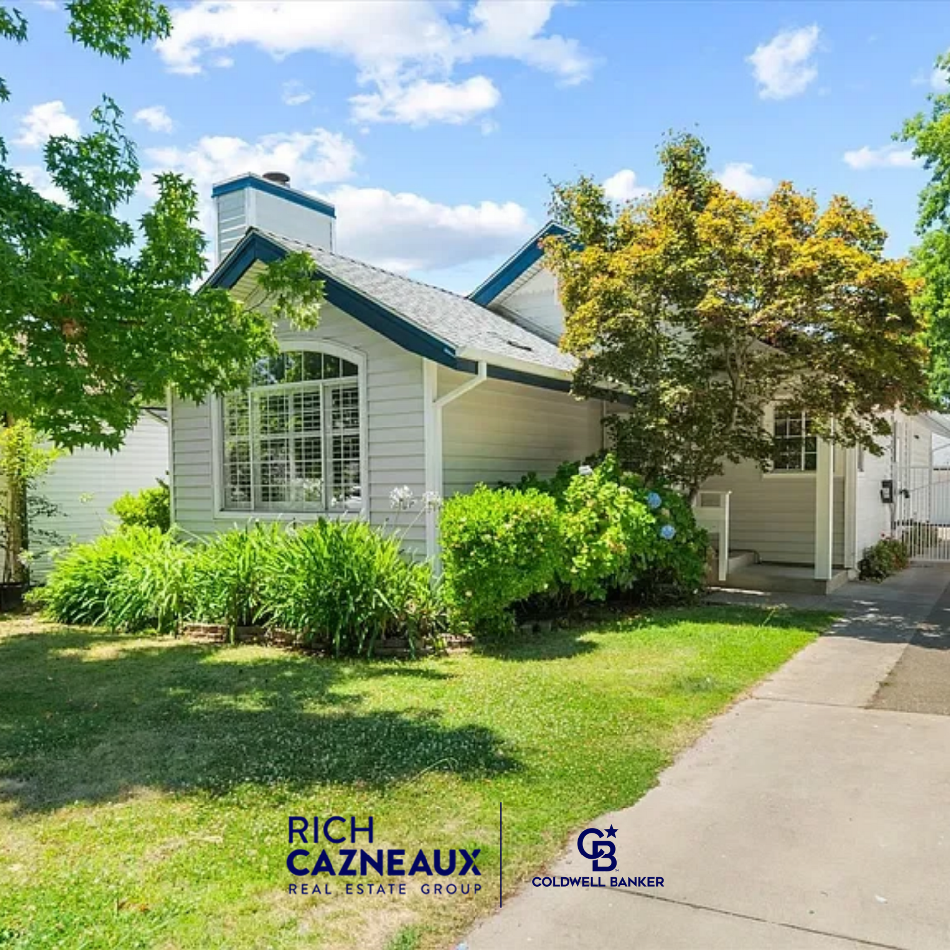 East Sacramento home with arched windows and mature landscaping listed by Rich Cazneaux - Coldwell Banker Sacramento.