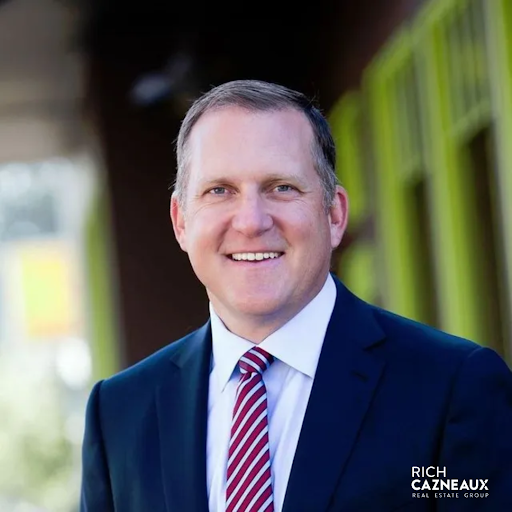 Rich Cazneaux, a leading listing agent in East Sacramento, CA, smiling in a professional headshot, wearing a suit.