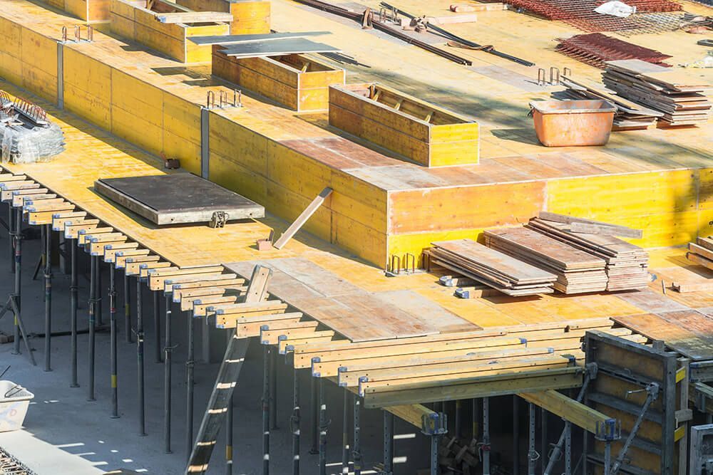 a construction site with a lot of steel beams