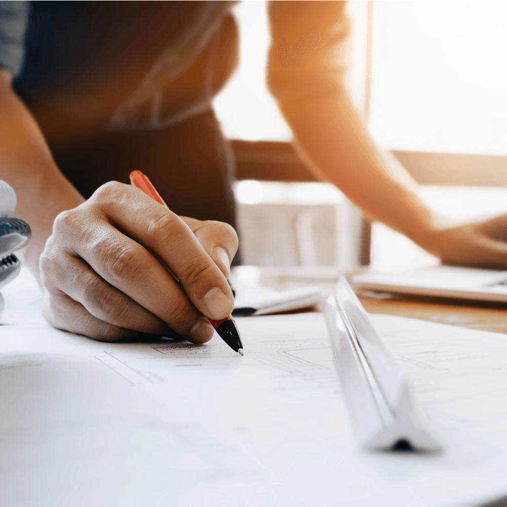 man writing tehnical documents