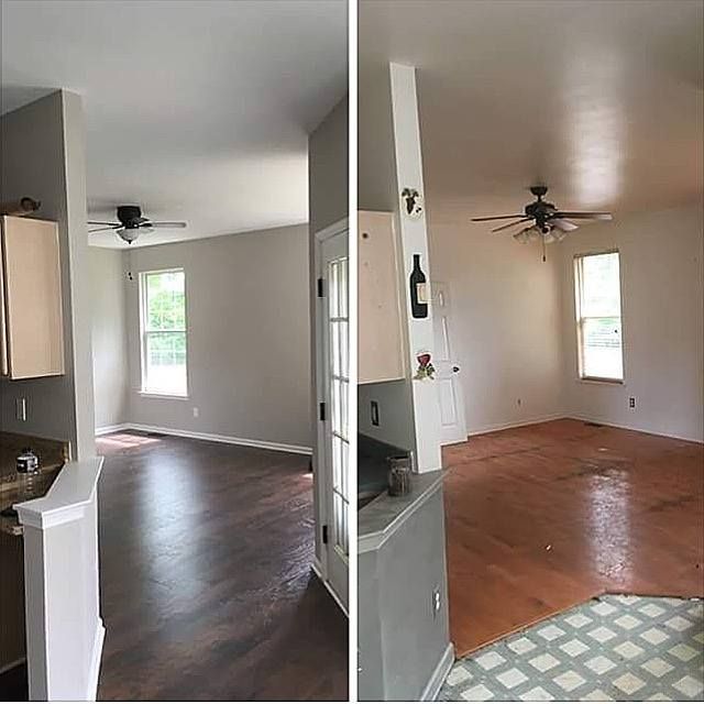 Before-and-after view of a room with new dark hardwood floors and old worn flooring, white walls, and ceiling fans