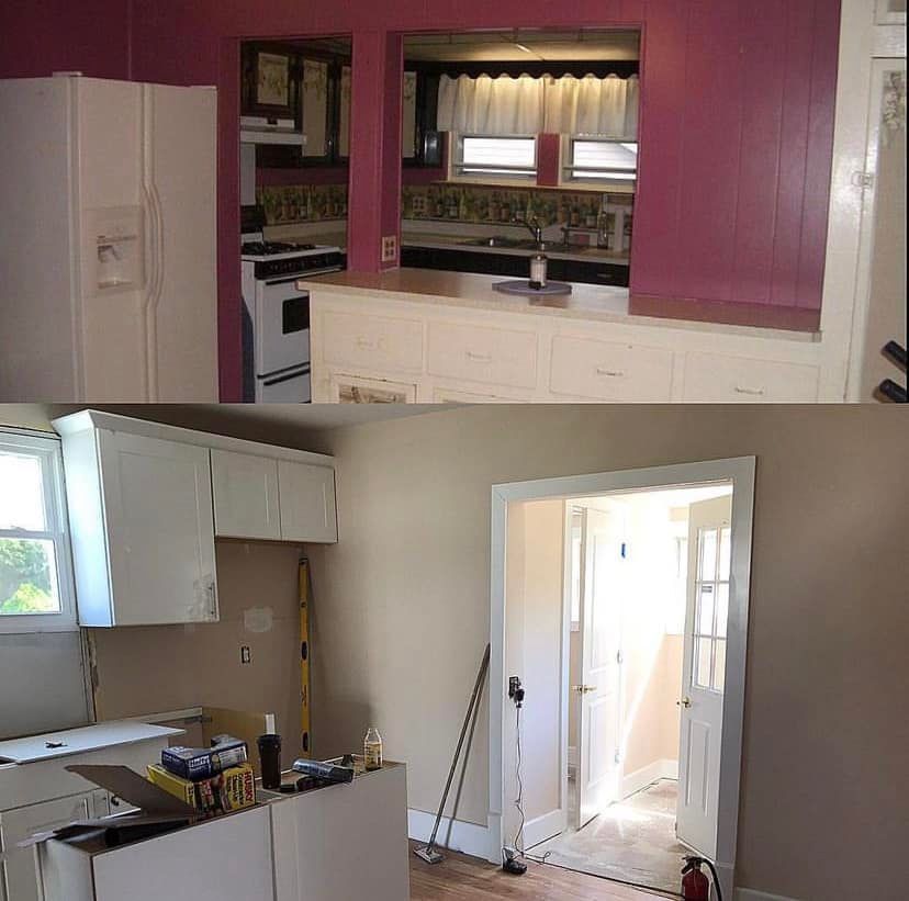 Kitchen renovation with purple walls, unfinished cabinets, and tools on the floor
