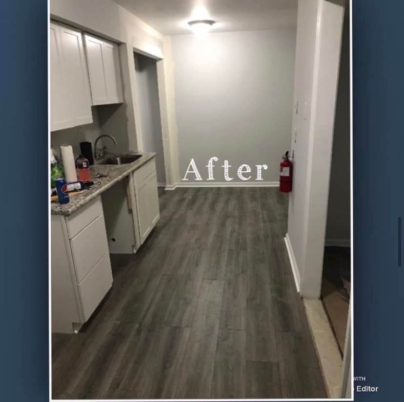 Empty apartment hallway with gray wood floors, white walls, and kitchen cabinets on the left, labeled “After.”