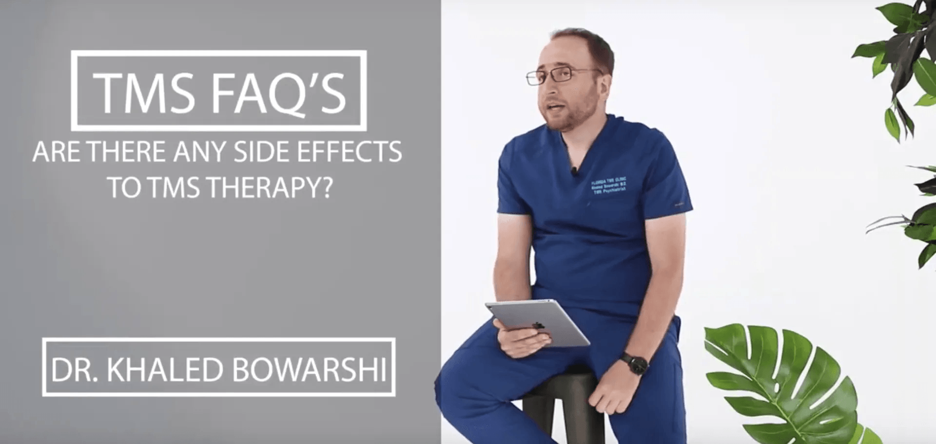 Man in blue shirt holding tablet, discussing TMS therapy side effects. Text: TMS FAQ’s, Dr. Khaled Bowarshi.