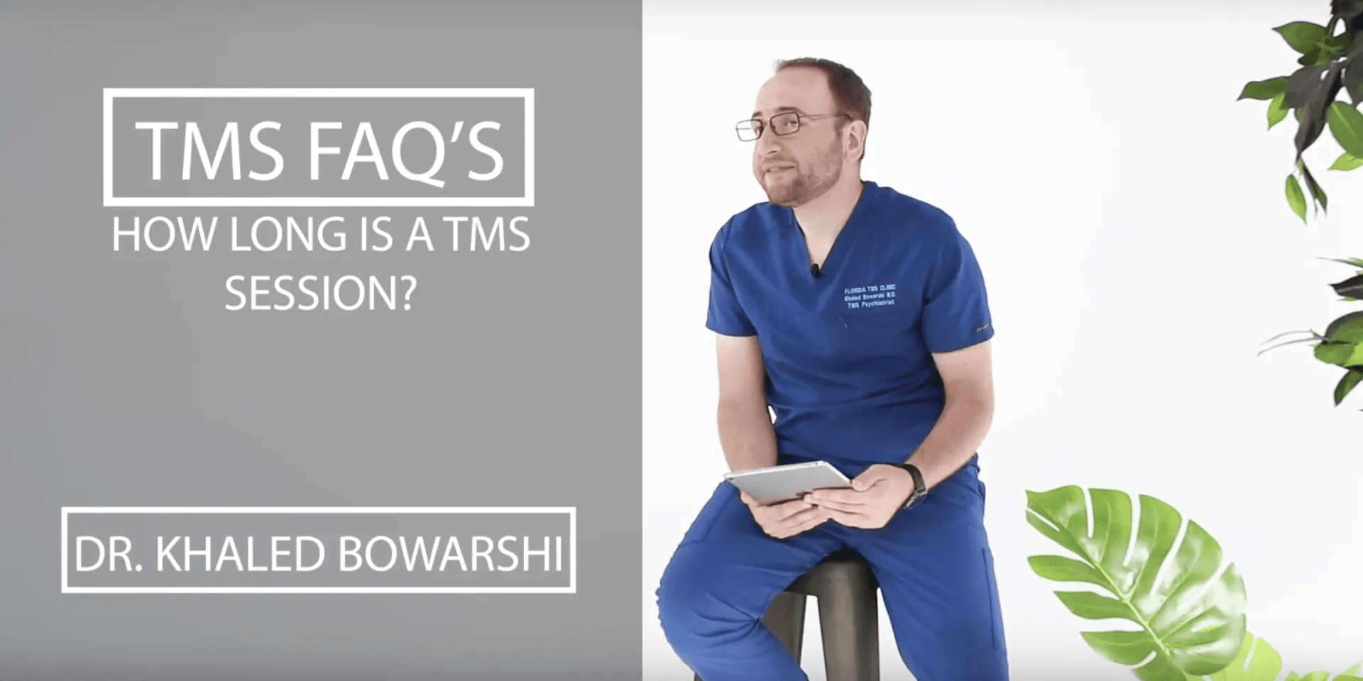 A man in blue scrubs sitting, holding a tablet; text reads 