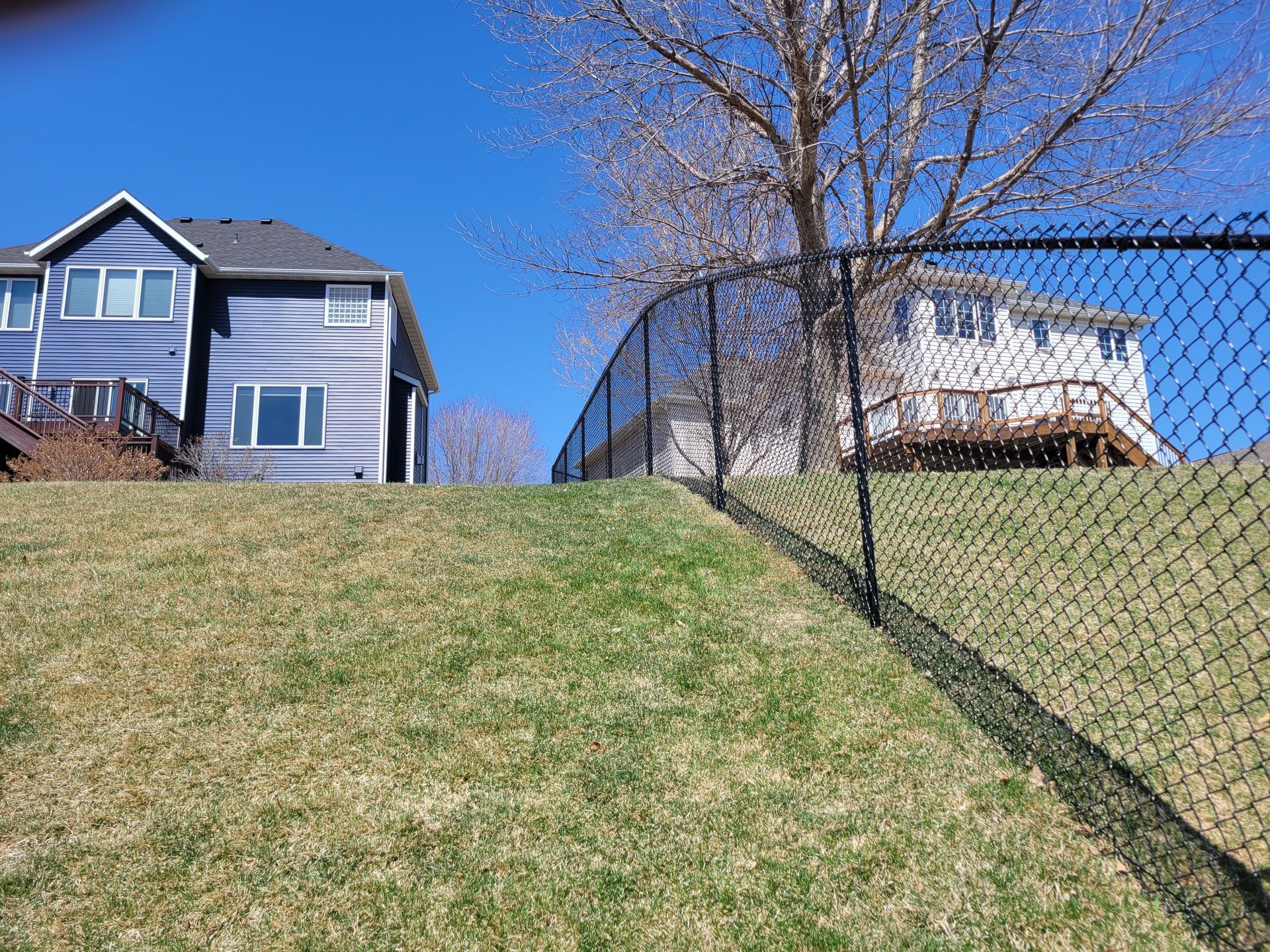 Chain Link Between Houses | Rochester, MN | The Fence Pro’s