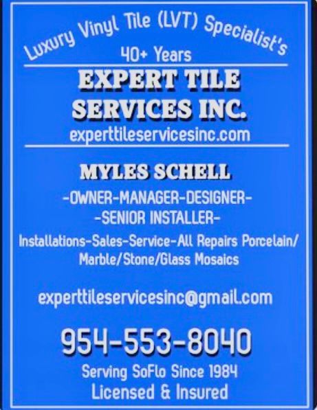 A blue sign for expert tile services inc.