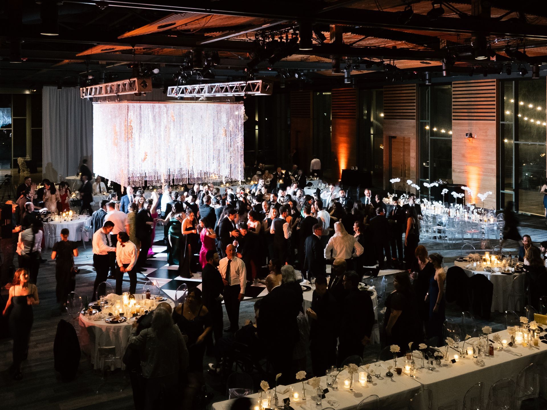 Wedding reception at the Witte Museum Mays Family Center in San Antonio with DJ, dance floor.