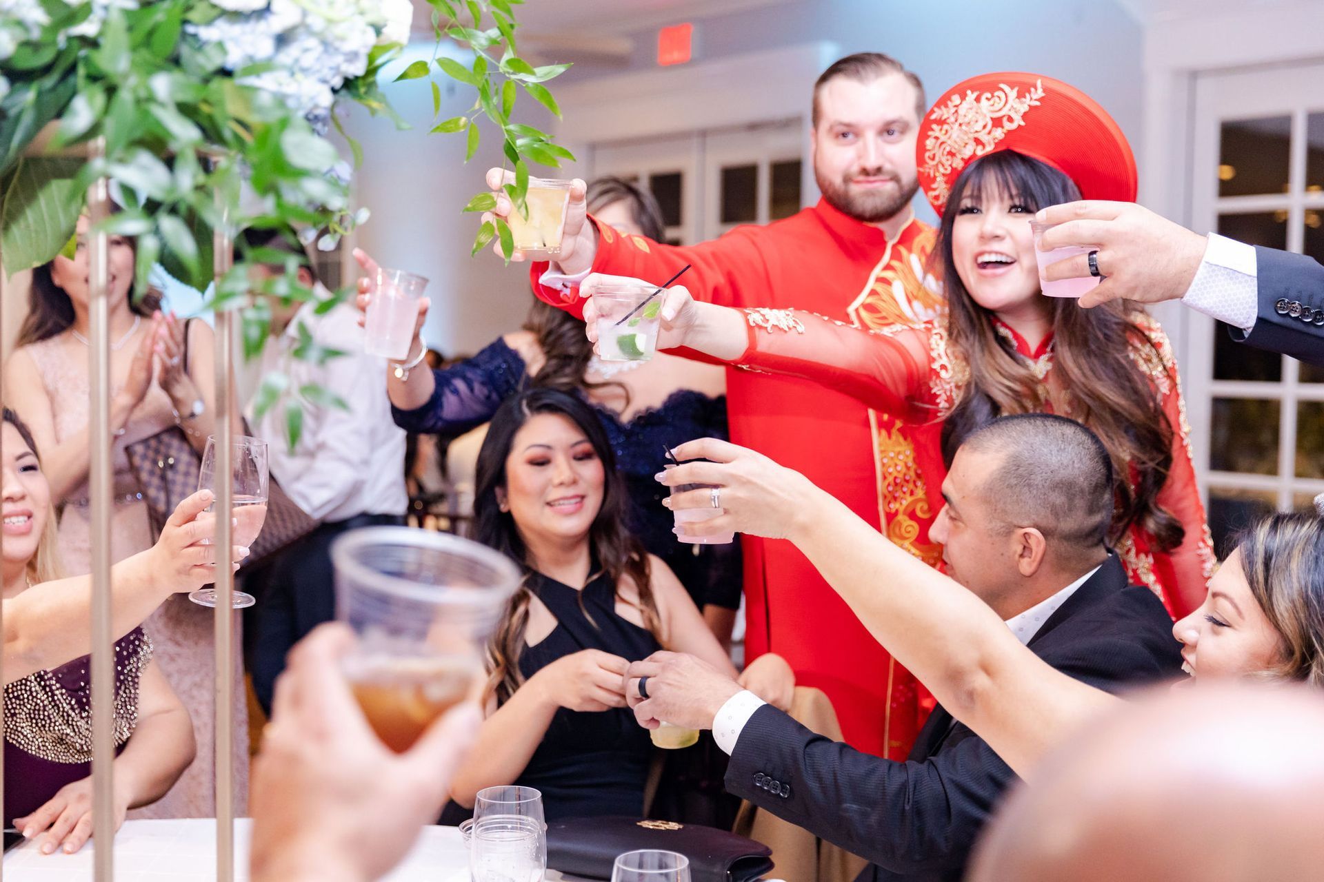 Wedding Reception guests toasting