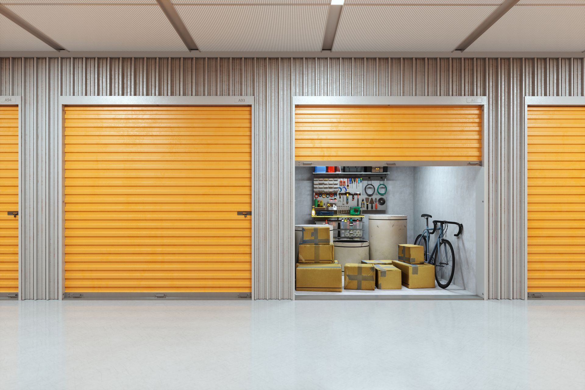An organized self-storage facility featuring orange storage doors.