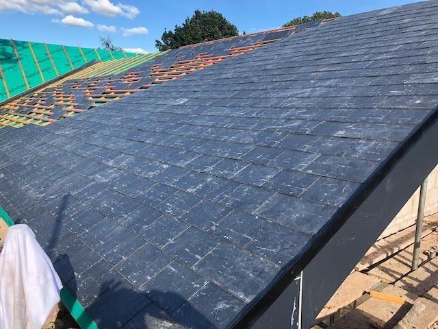 New slate roofs by Darlington Roofers Masterhouse Services Limited