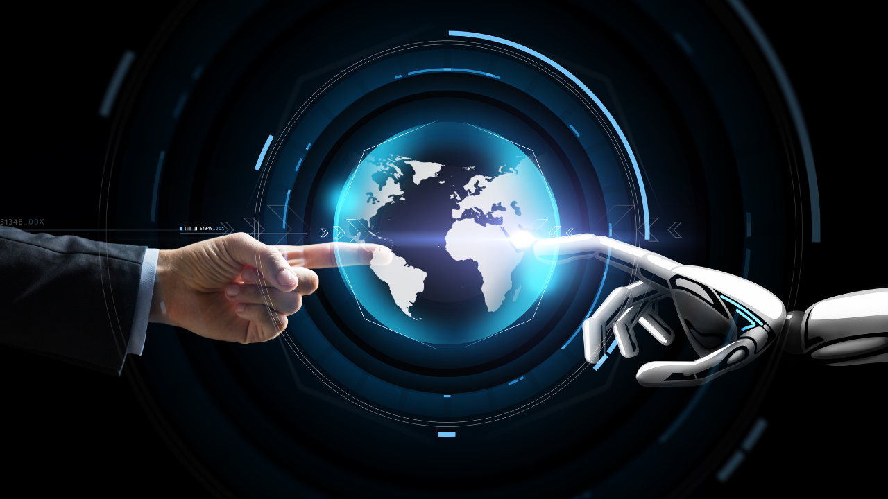 A man and a robot are touching each other 's fingers.