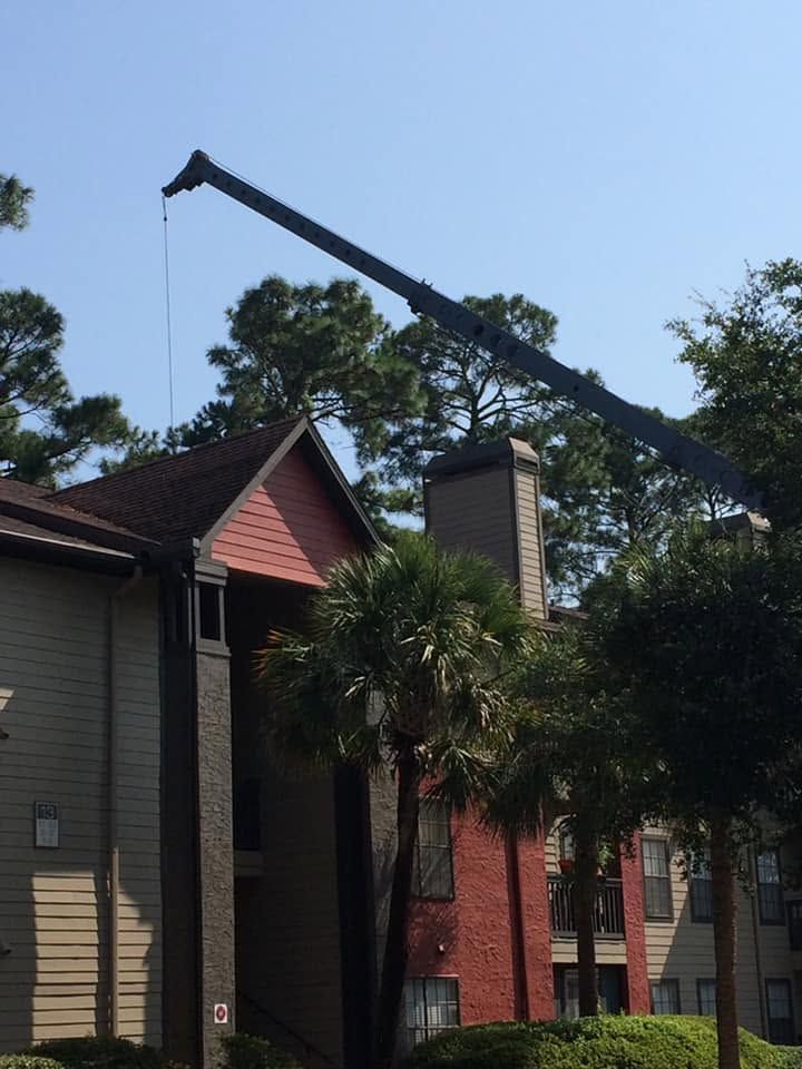 75 ton crane used to extract trees by Jeff Mobley Tree Service