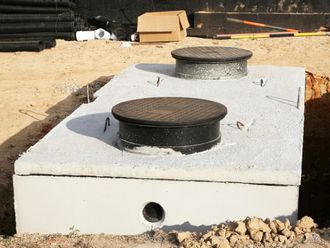 Concrete Septic Tank is Being Built in a Dirt Field — North Branch, MN — Hassle Free Septic Concrete Septic Tank is Being Built in a Dirt Field — North Branch, MN — Hassle Free Septic