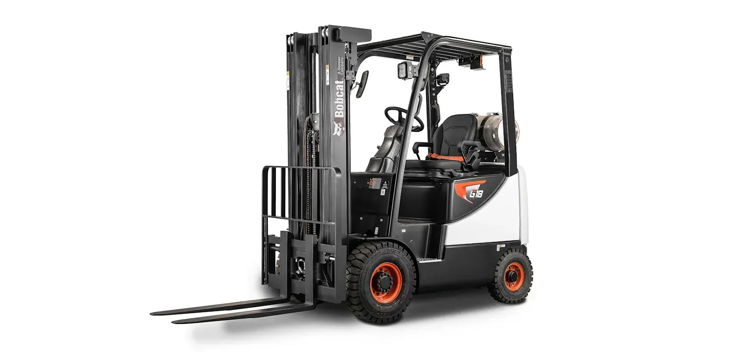 A black and orange forklift is sitting on a white background.