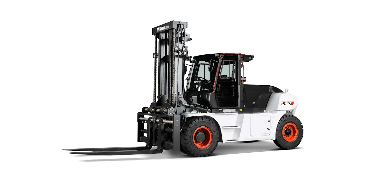 A forklift is sitting on a white surface.