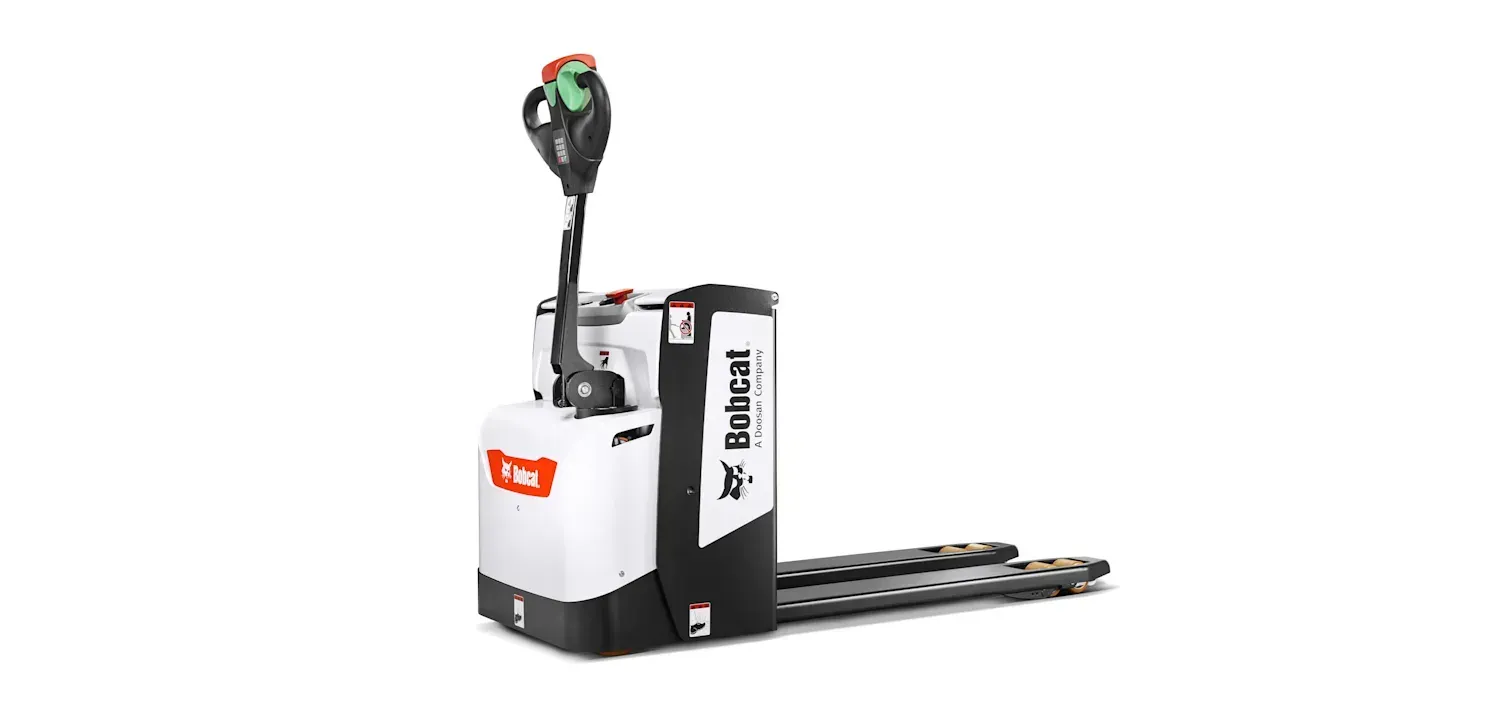 A white and black pallet truck is sitting on a white surface.