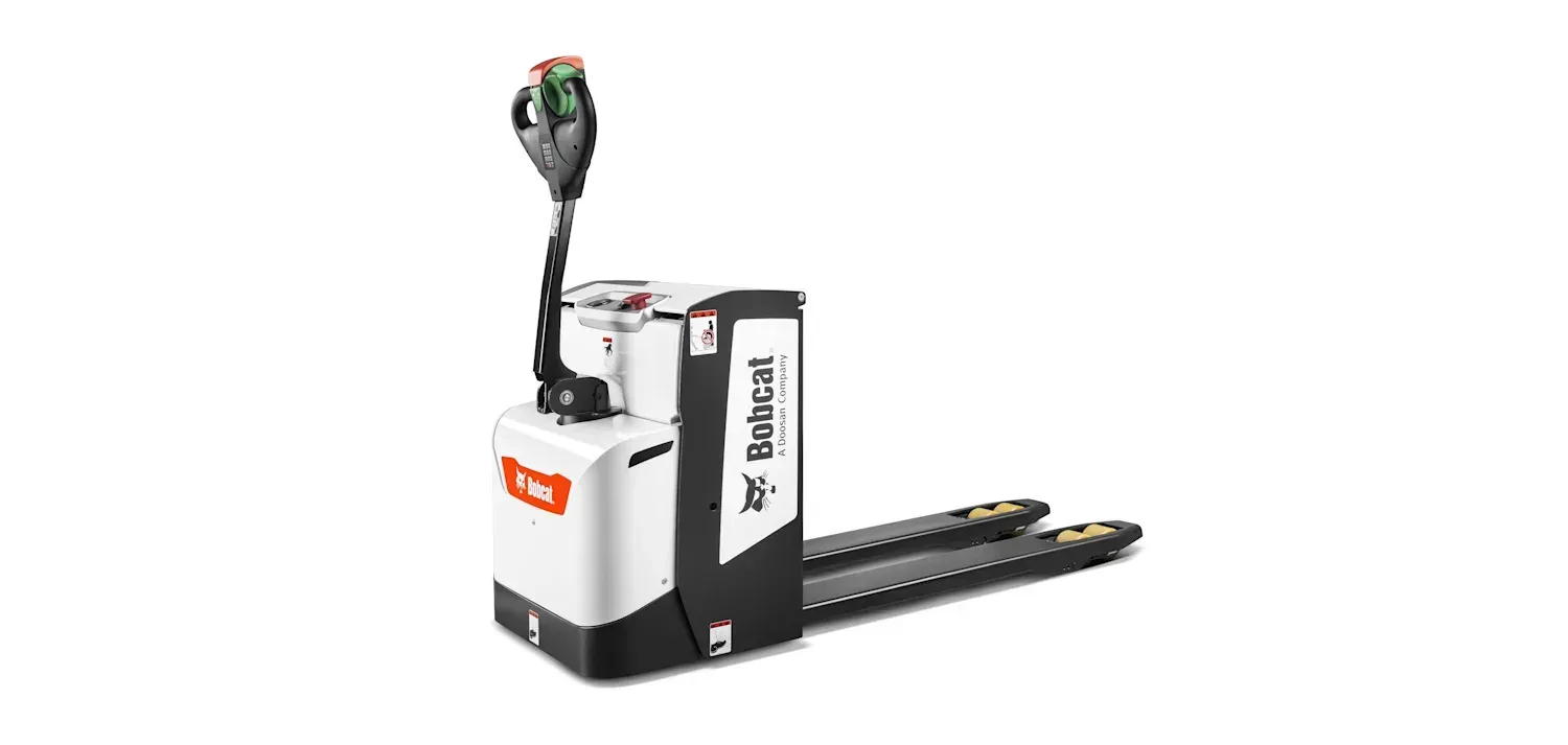 A white and black pallet truck is sitting on a white surface.