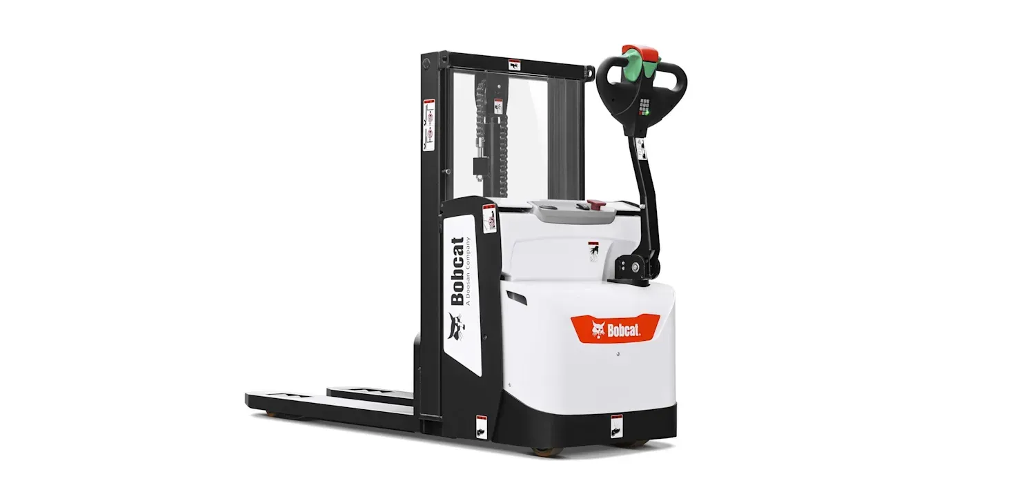 A white and black forklift is sitting on a white surface.
