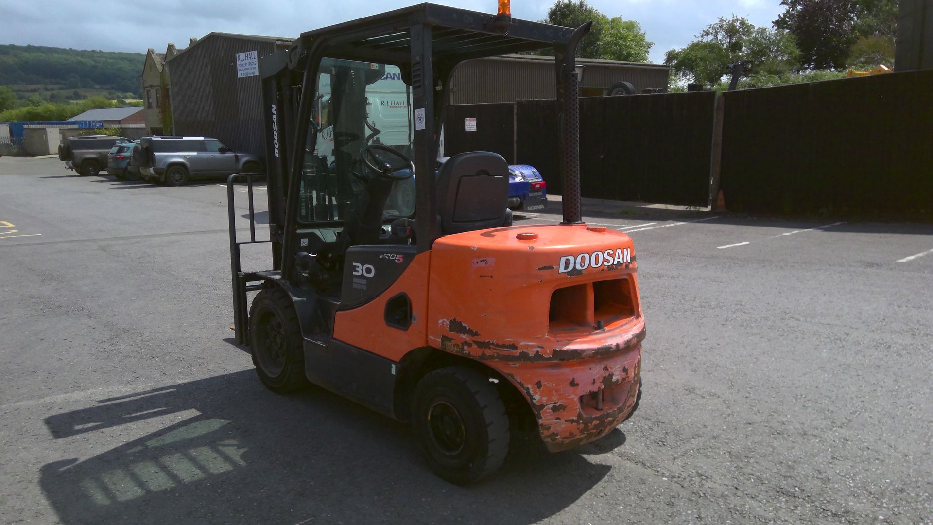 Orange forklift truck for hire or sale from RJ Hall Forklifts Redditch