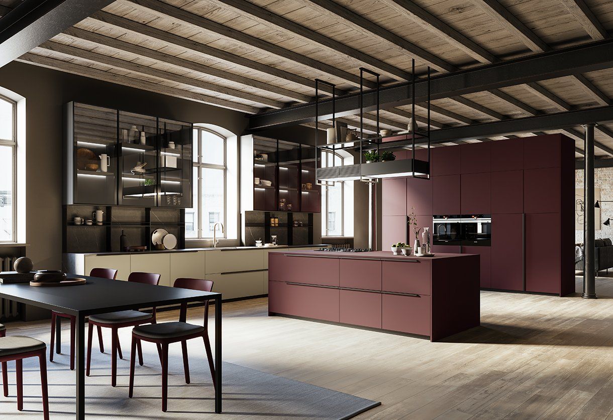 Una cucina con tavolo e sedie