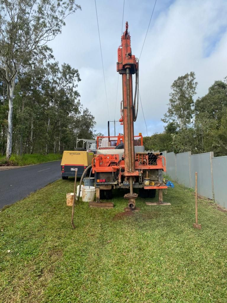 A Truck is Being Used to Drill a Hole in the Ground — FNQ Drilling in Innisfail, QLD