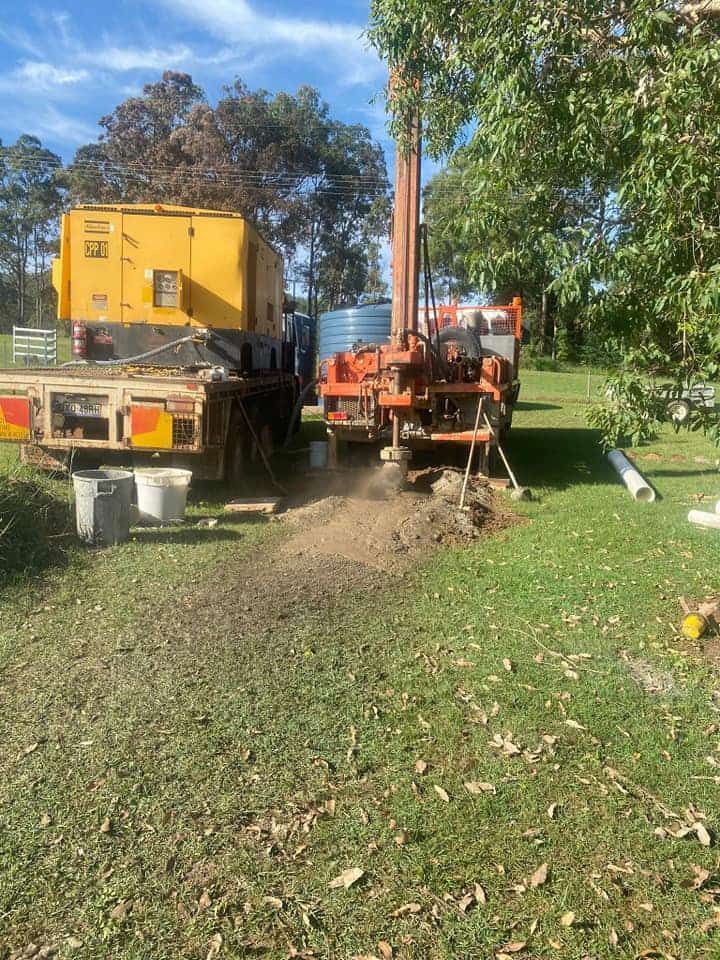A Large Excavator is Working on a Construction Site — FNQ Drilling in Mareeba, QLD