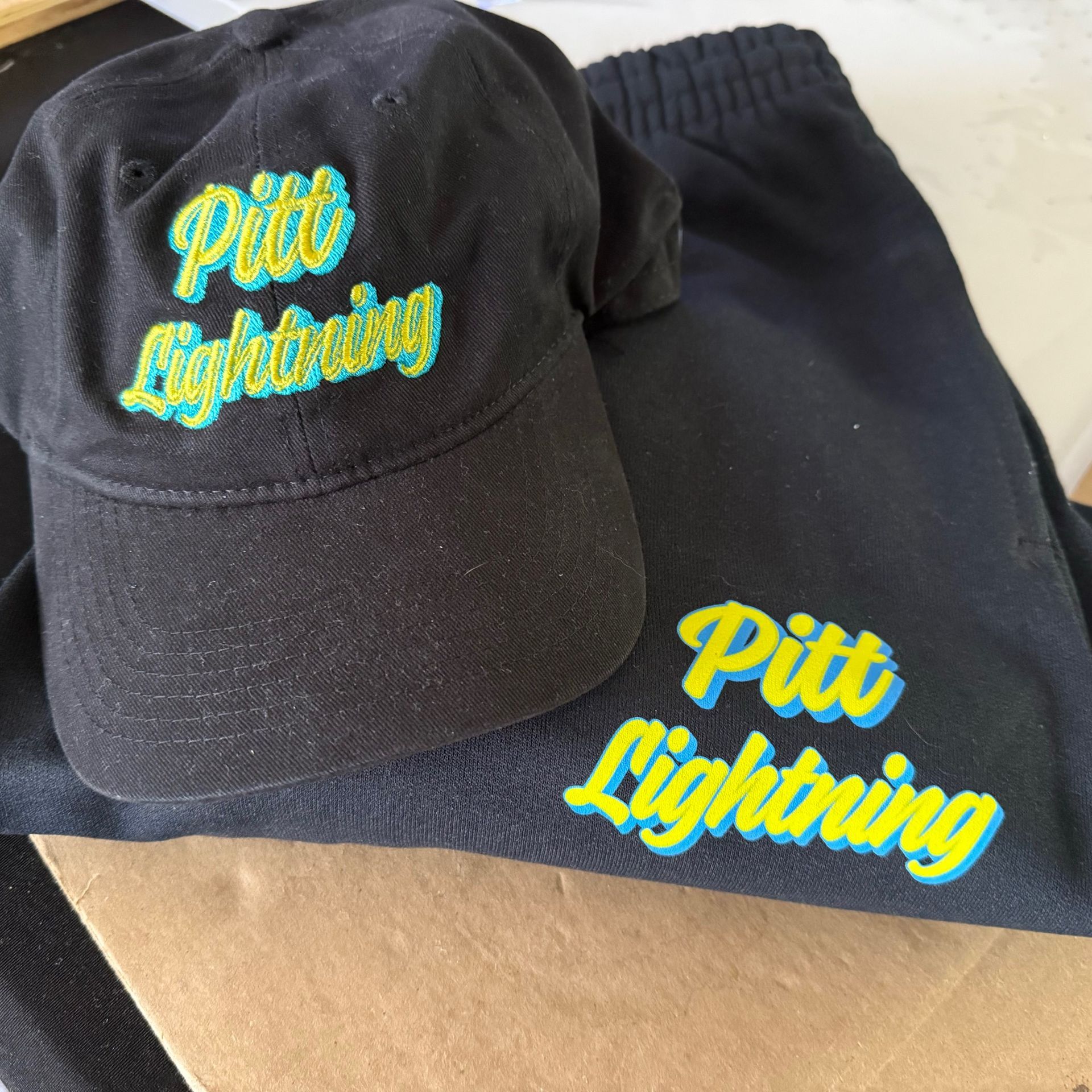 A hat that says pitt lightning on it