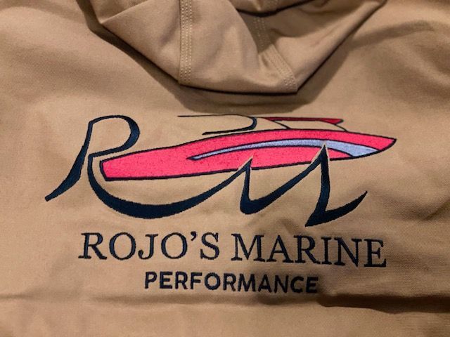 A hoodie that says rojo 's marine performance on it