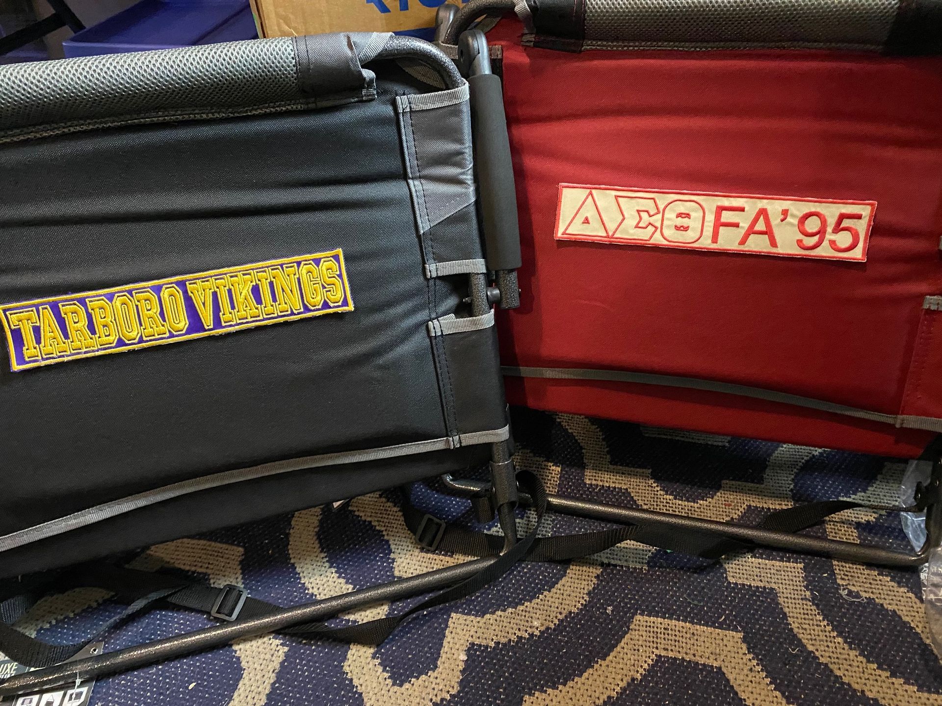 A black and red chair with a sticker that says arg fa 95