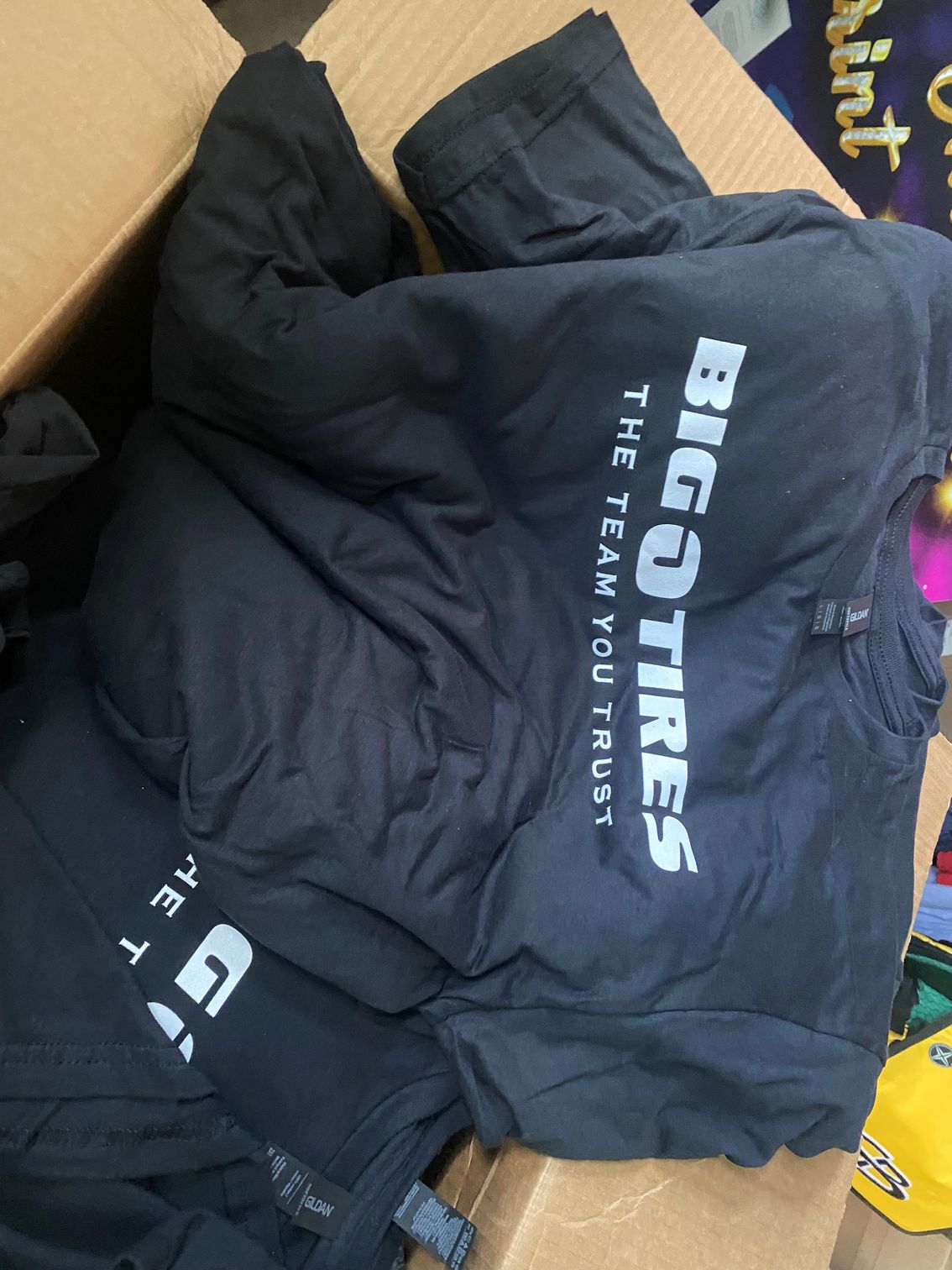 A black shirt that says big tires on it