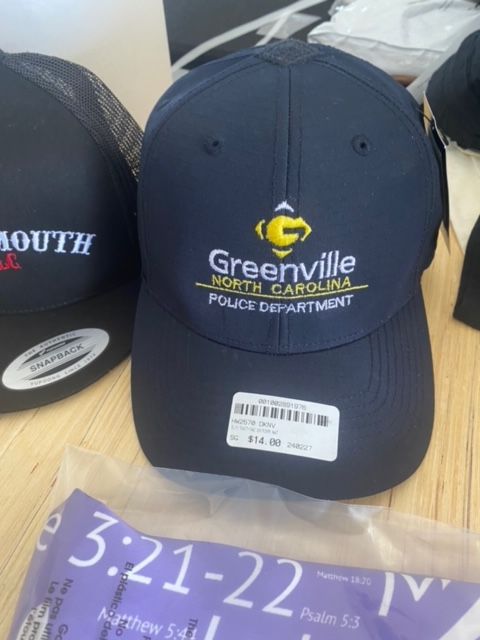 A baseball cap that says greenville north carolina police department
