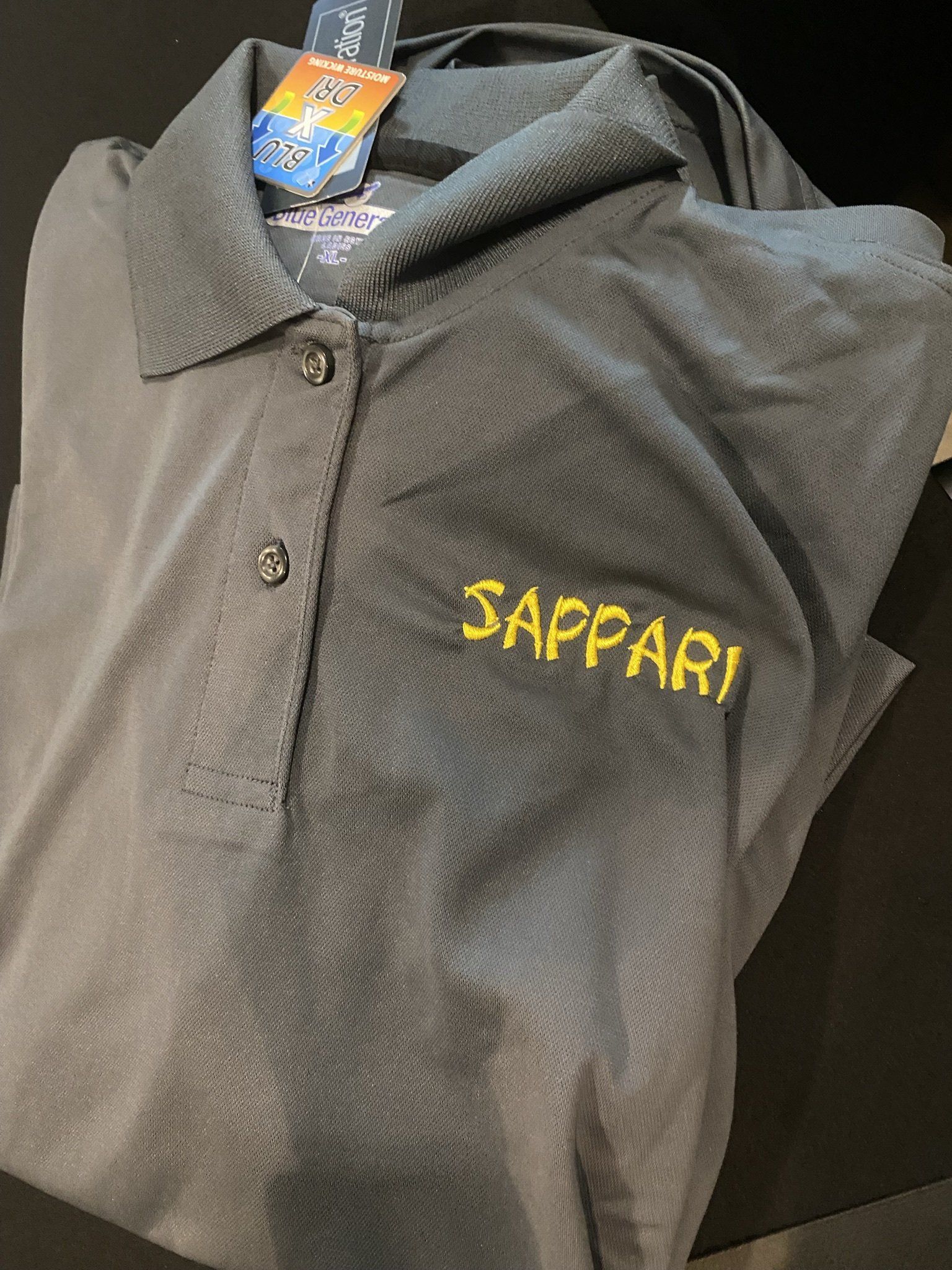 A grey polo shirt with the word sappari embroidered on it
