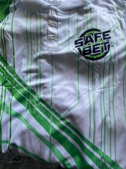 A white and green striped shirt that says safe bet