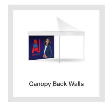 A picture of a canopy with a banner on the back wall.