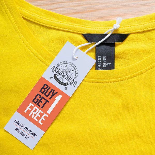 A yellow shirt with a tag that says buy 1 get free