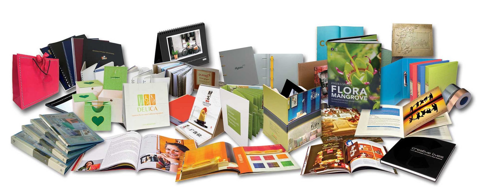 A bunch of different types of papers and books on a table