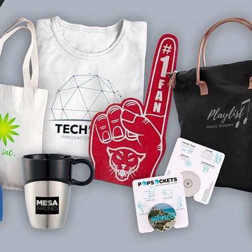 A variety of promotional items including a t-shirt , mug , tote bag , and popsockets.