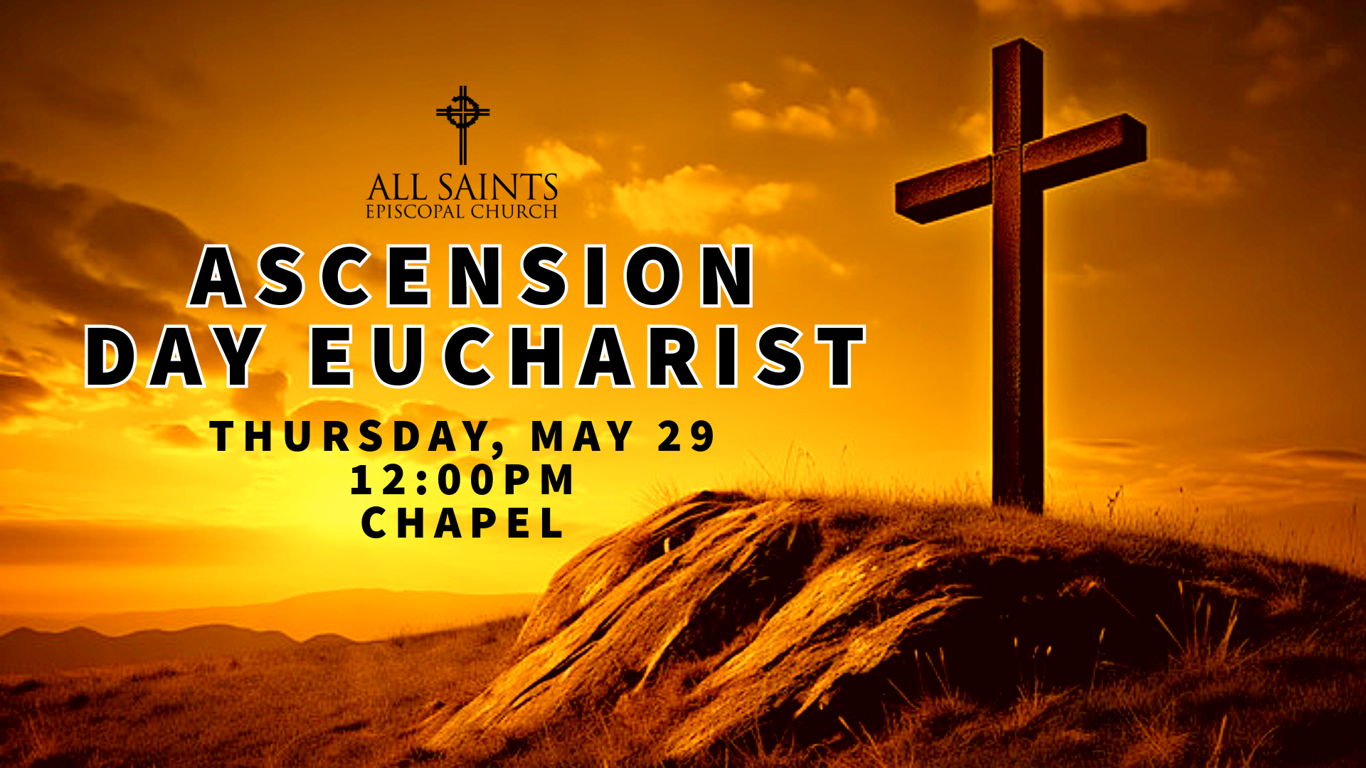 A cross is sitting on top of a hill with a sunset in the background.
