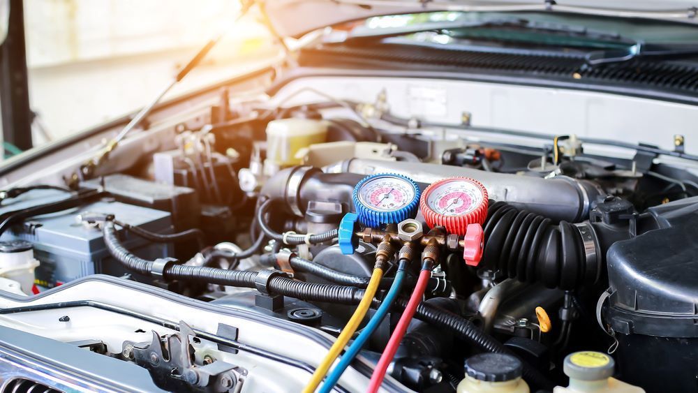 A Car Engine With Gauges Attached to It — P & R Automotive Services in Pialba, QLD